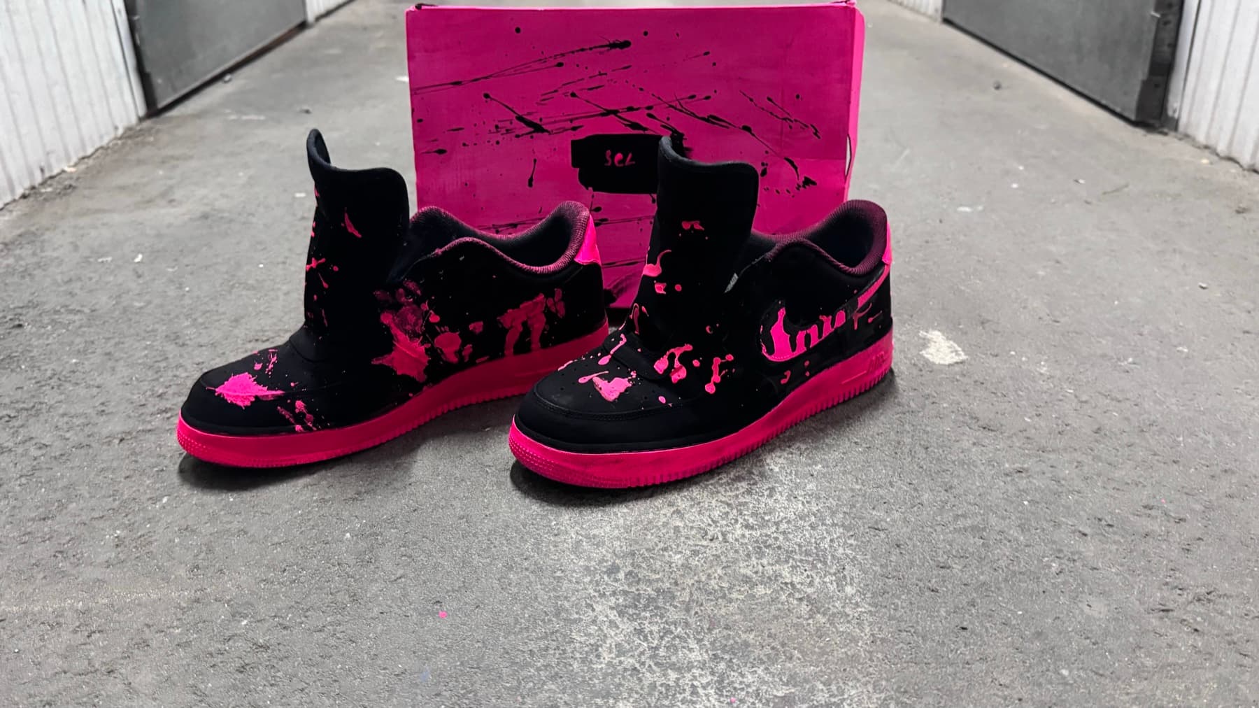 Pink Splatter Blackout Low studio sneaker shot